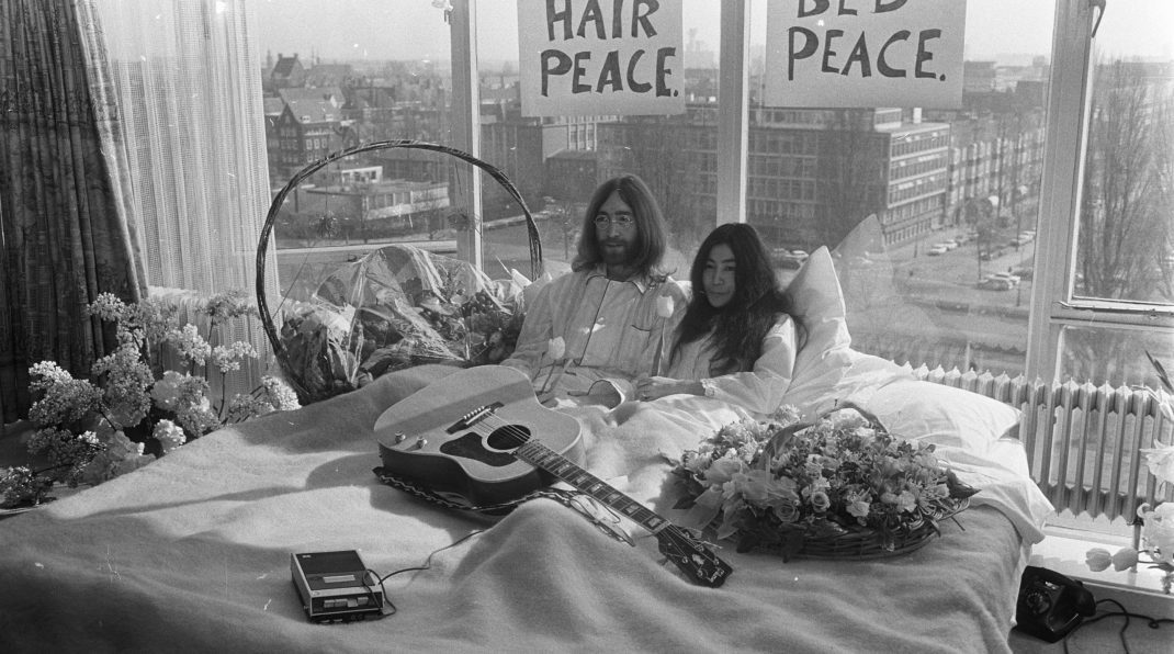 Yoko Ono and John Lennon in their hotel room in Amsterdam