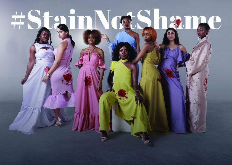 Women wearing statement pieces from Stain Not Shame campaign