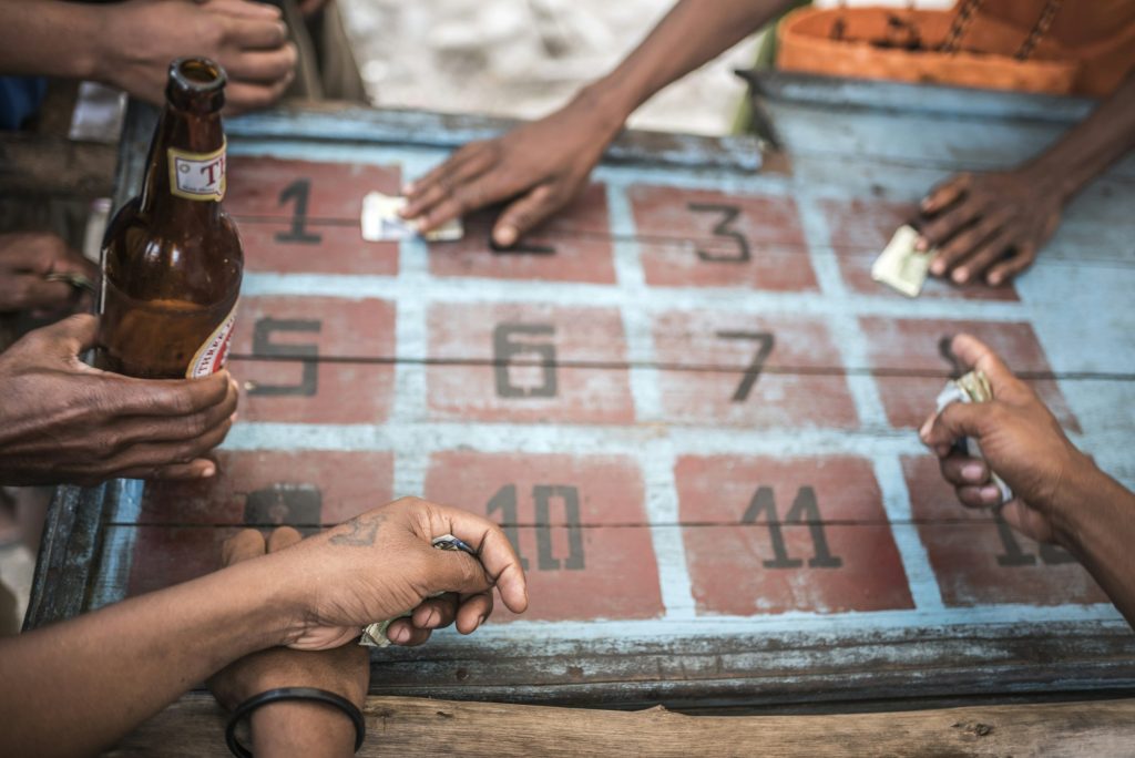 Gambling in Ranomafana, a common past time on a Sunday, Madagascar Central Highlands