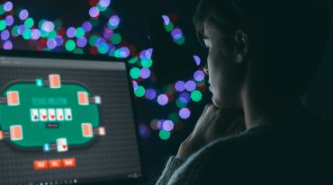 Woman playing online poker