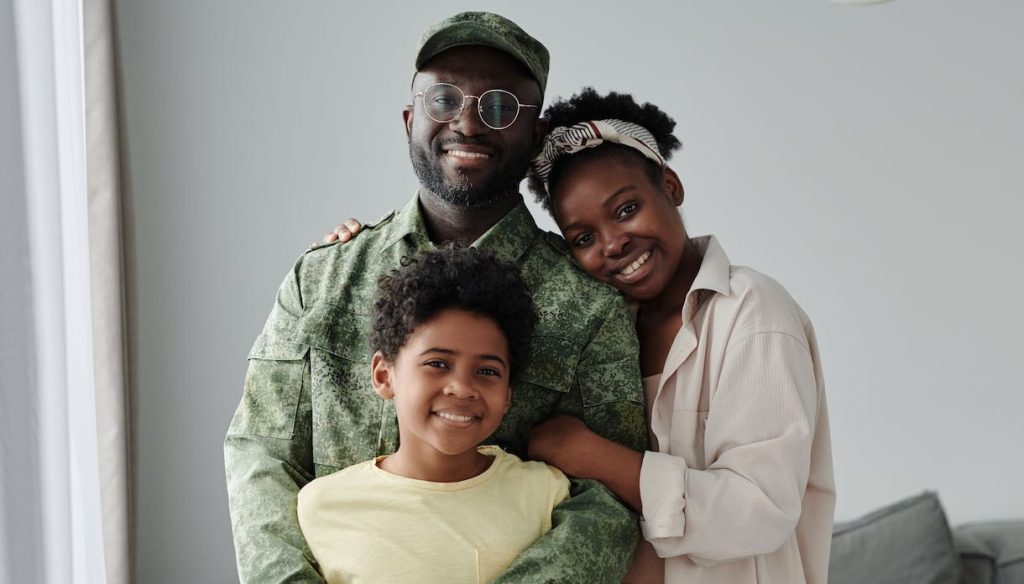 book happy family meeting their dad from war (Photo via Envato Elements)