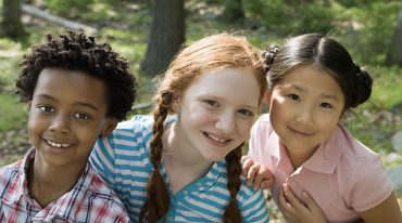 Schoolchildren with classmates (Photo via Envato Elements)