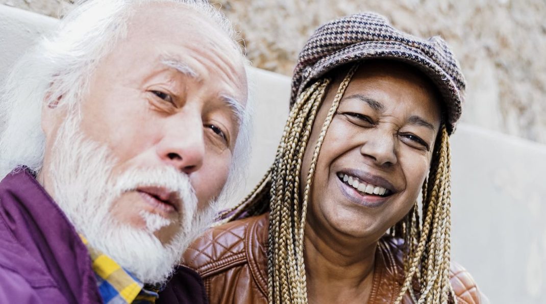 Multiracial senior couple having fun (Photo via Envato Elements)