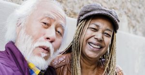 Multiracial senior couple having fun (Photo via Envato Elements)