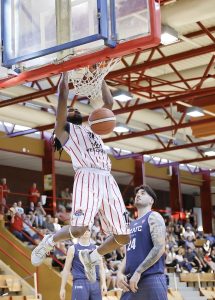 Basketball player Marlon Moore Jr. two-handed dunk (Photo by Péter Szász)