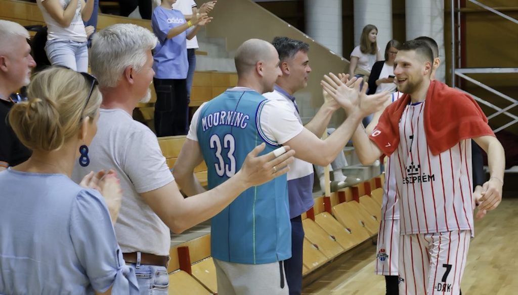 Basketball Players and Fans (Photo by Péter Szász)